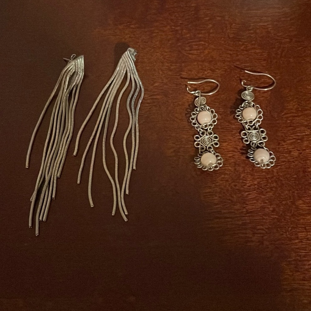 Two sets of sterling silver earrings